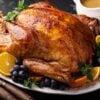 Festive celebration roasted turkey with gravy for Thanksgiving or Christmas