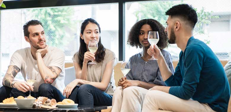 People enjoying a fine dining event in their own home
