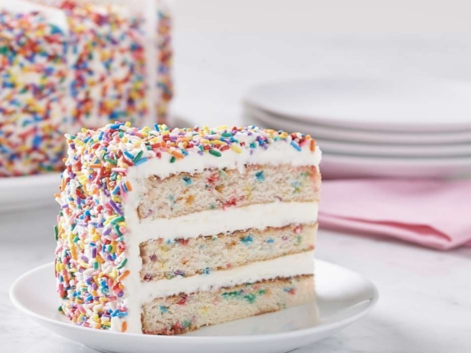 3 layer Rainbow Iced Sprinkle Cake